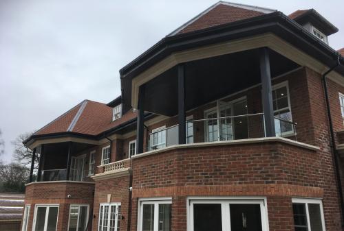 Balcony Installations frameless glass balustrades with angles and no posts