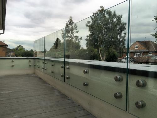 Balcony Installations side fixed glass balustrades without handrail